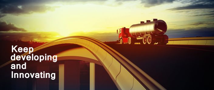 red truck on blurry asphalt road